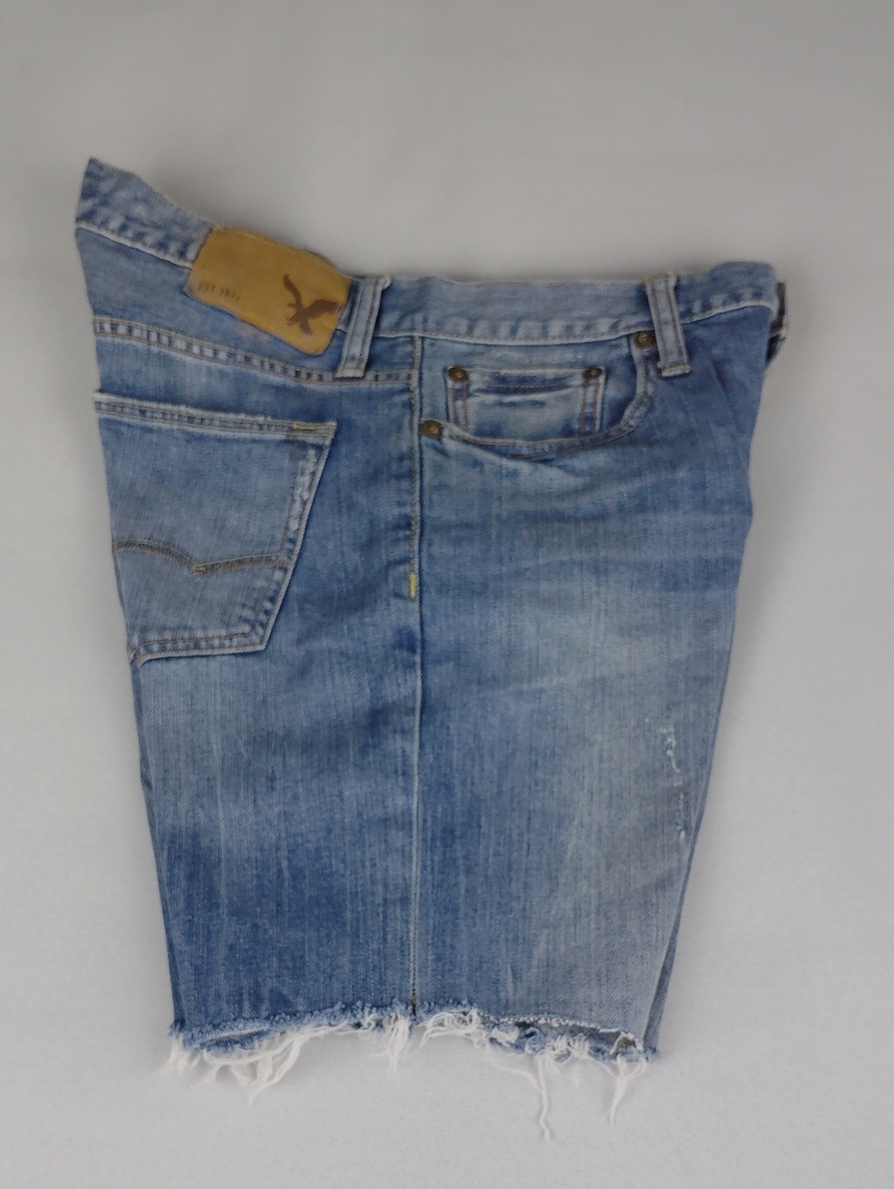 American Eagle Outfitters Women's Light Blue Distressed Denim Cut-Off Shorts.
